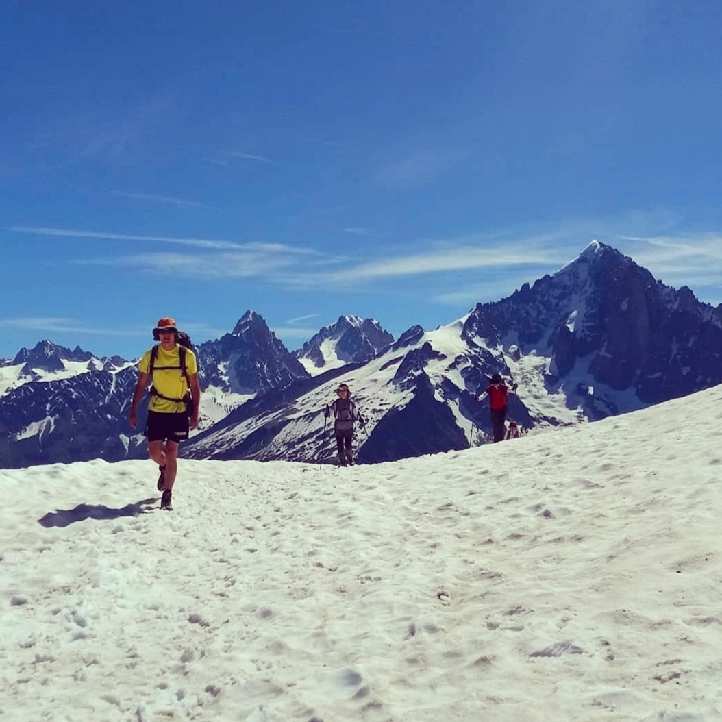 Jeremy hiking a snowfield